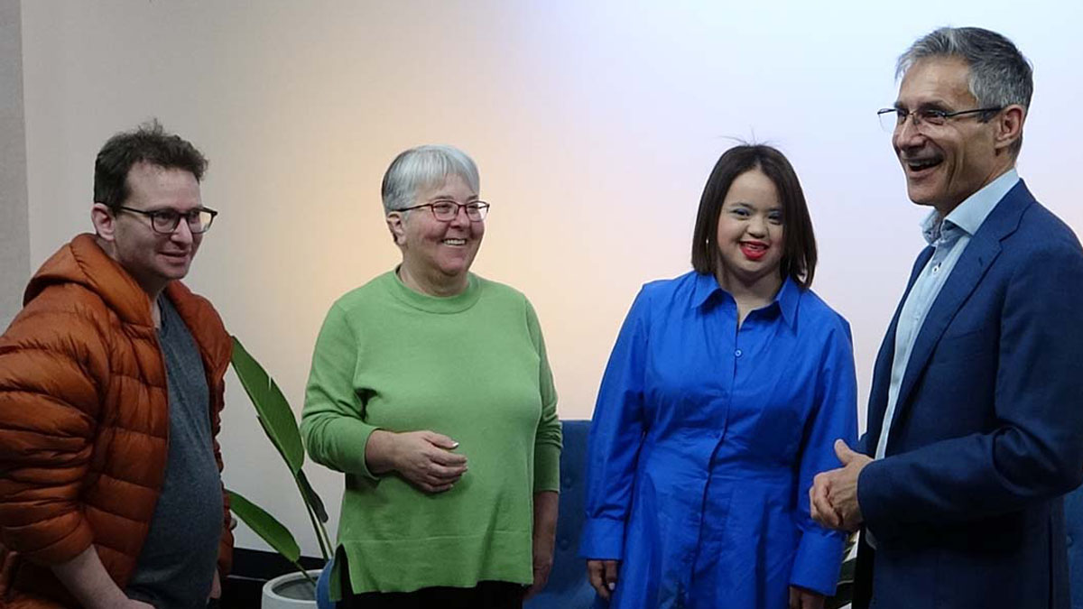 Ricky, Judy, Olivia and Julian laughing and talking at the conference studio