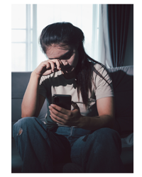 Photo of a girl with intellectual disability looking sad.