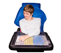Photo of a woman with an Augmentative and Alternative Communication device.