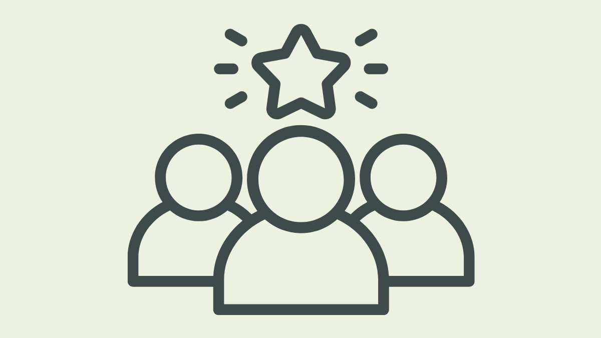 Outline illustration of three people standing together under a sparkling star.