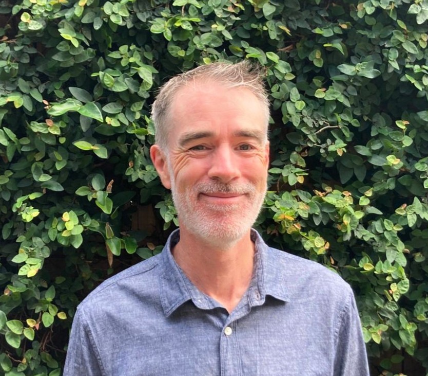 A head shot of James Cox.