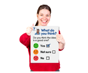 Photo of a girl holding a piece of paper that says - What do you think? Yes. Not sure. No.