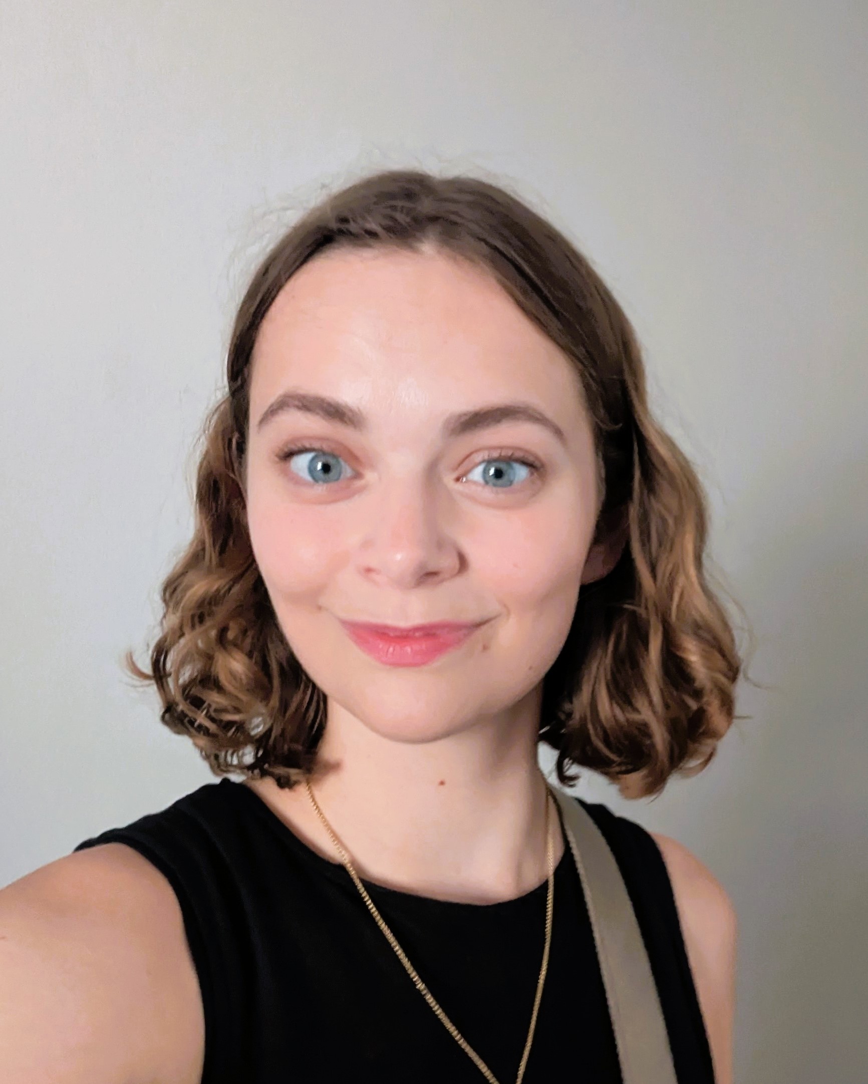 Photo of Sioban Humphreys. She is wearing a black top and smiling at the camera.