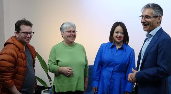 Ricky, Judy, Olivia and Julian laughing and talking at the conference studio