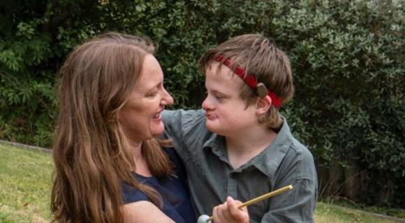 Rebecca and her son Ryan playing in the garden