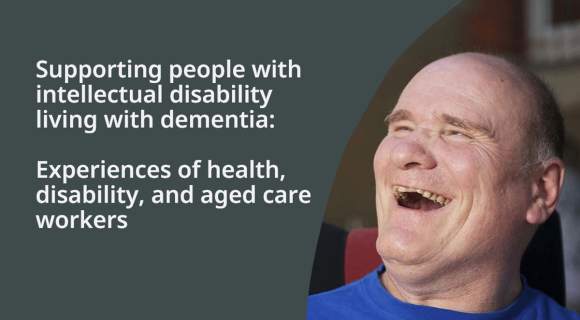 Older man with dementia laughing.