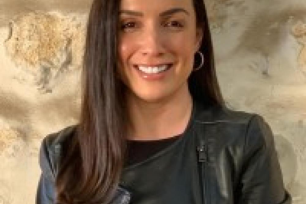 Photo of Dragana Prodanovic. She is smiling at the camera.