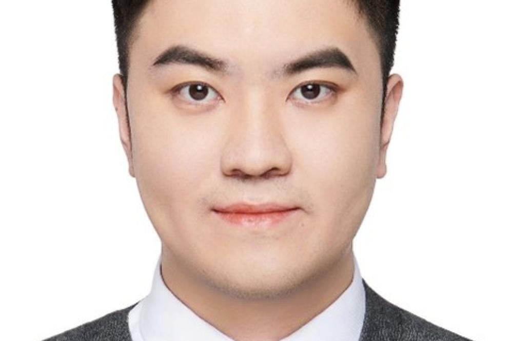 A head shot of Zhiyuan Wang.