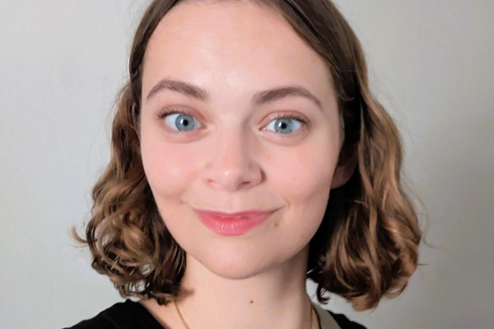 Photo of Sioban Humphreys. She is wearing a black top and smiling at the camera.